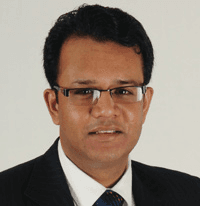 Dr. KARTIK BARUAH